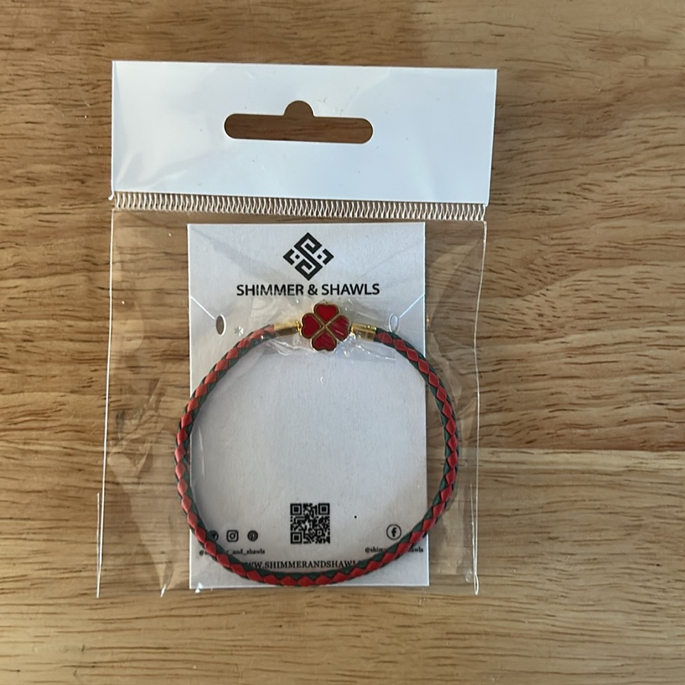 Genuine Woven Leather and Stainless Steel Four
Leaf Clover Charm Bracelet - Picture 5 of 8